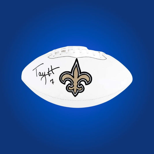 New Orleans Saints logo football signed by Taysom Hill, signature and logo displayed.