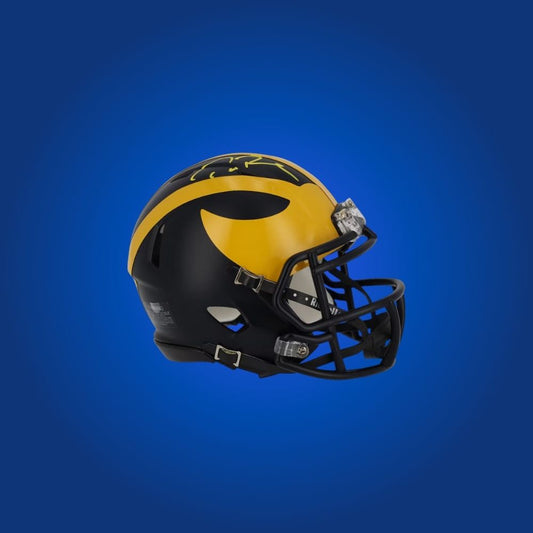 Tom Brady signed Michigan Wolverines mini helmet—rare collectible for Michigan fans and memorabilia enthusiasts.