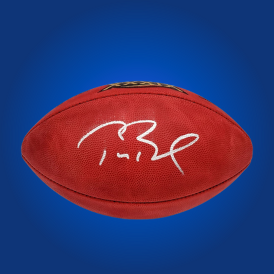 Tom Brady signed Tampa Bay Buccaneers logo football, showcasing his autograph, essential for Buccaneers fans and NFL collectors.