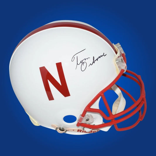 Autographed Nebraska Cornhuskers full size Authentic Helmet signed by Tom Osborne, displayed on a white background. SportsMarkets product image.