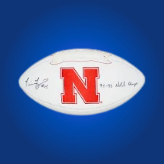 Tommie Frazier autographed Nebraska Cornhuskers white logo football, essential memorabilia for Cornhuskers fans and collectors.