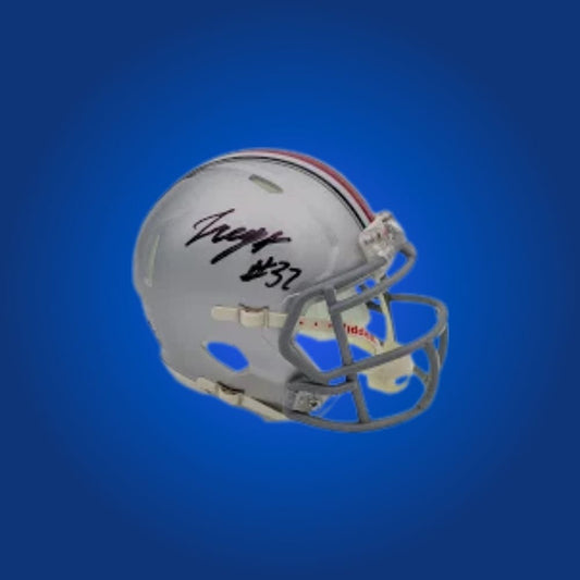 TreVeyon Henderson signed Ohio State Buckeyes mini helmet—valuable collectible for Buckeyes fans and Henderson supporters.