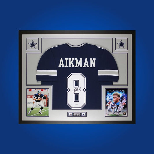 Autographed Dallas Cowboys custom jersey by Roger Staubach with Certificate of Authenticity.