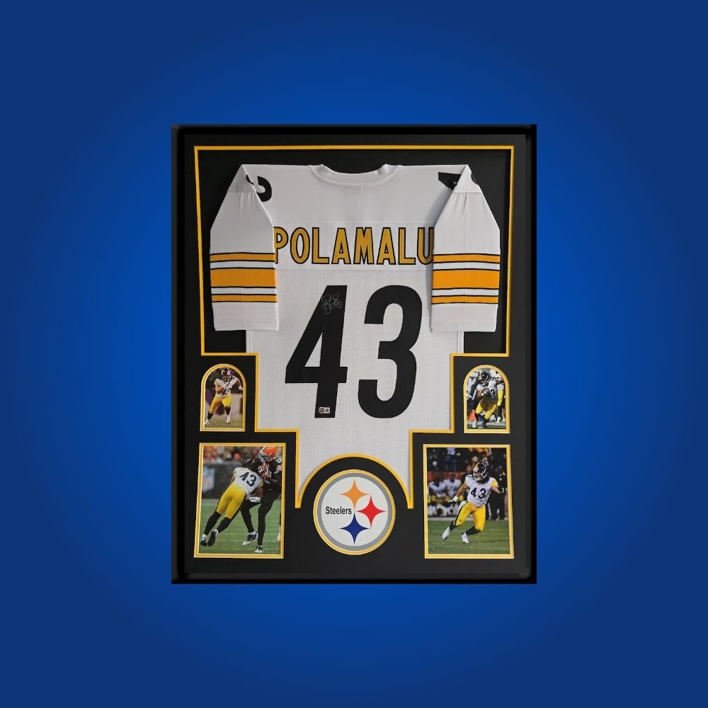 Autographed Pittsburgh Steelers custom jersey by Troy Polamalu with Certificate of Authenticity.