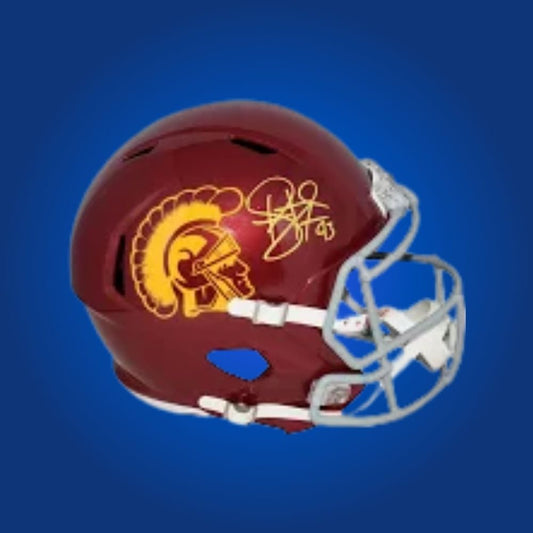 Autographed full size replica helmet by Troy Polamalu, legendary USC Trojans safety and Pro Football Hall of Famer, presented on a crisp white backdrop for a premium presentation. Perfect for collectors and USC supporters. SportsMarkets memorabilia photo.