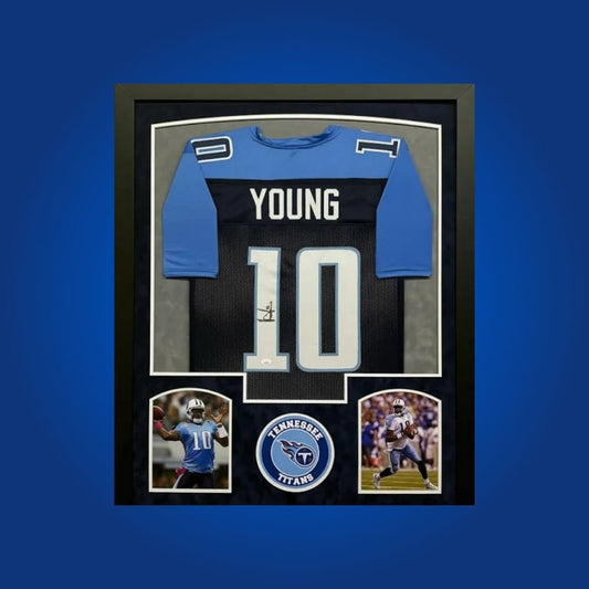 Autographed Tennessee Titans custom jersey by Vince Young with Certificate of Authenticity.