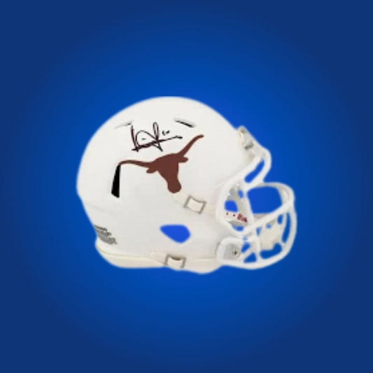 Vince Young signed Texas Longhorns mini helmet—sought-after collectible for Texas fans and Young memorabilia collectors.