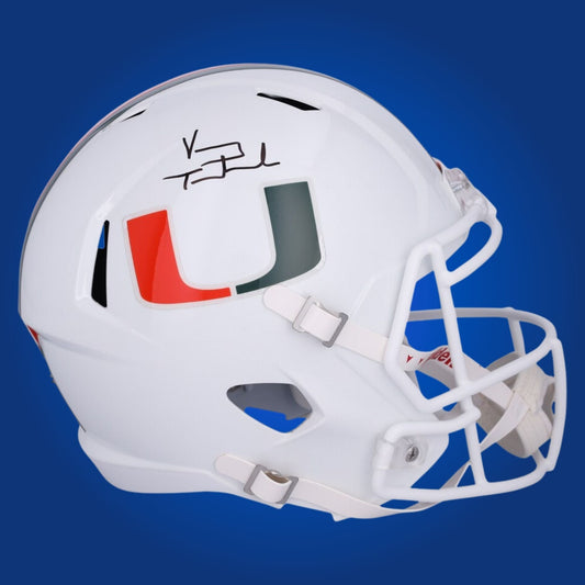 Autographed Miami Hurricanes full size replica helmet signed by Vinny Testaverde, presented on a white background. SportsMarkets memorabilia product image.