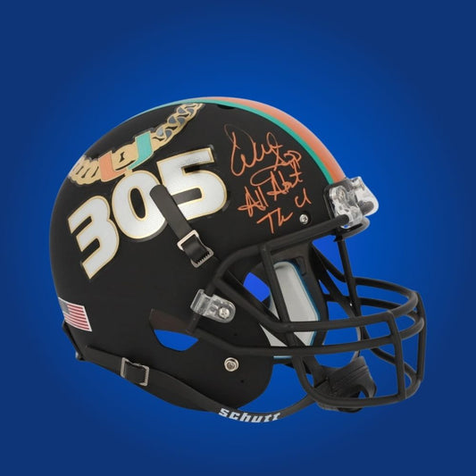 Warren Sapp hand-signed Miami Hurricanes blackout 305 replica helmet, showcasing signature and official team graphics. A unique collectible for Miami fans and Sapp memorabilia collectors. Includes Certificate of Authenticity. Images may differ for catalog uniformity.