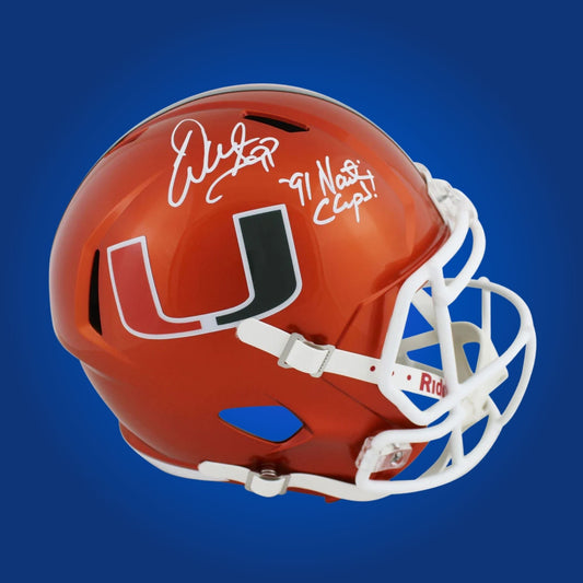 Autographed Miami Hurricanes full size replica helmet signed by Warren Sapp, presented on a white backdrop for clarity. SportsMarkets memorabilia image.