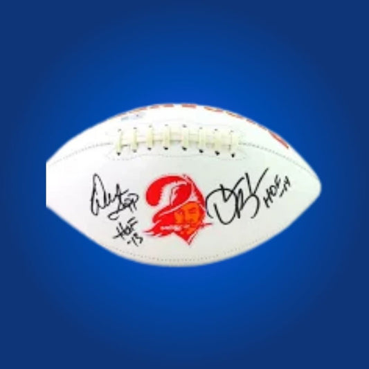Warren Sapp autographed Buccaneers logo football, with Hall of Fame defensive tackle’s signature and Bucs logo.
