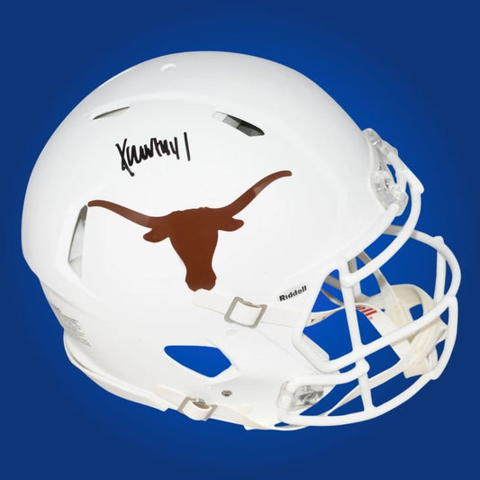 Autographed full size Authentic Helmet by Xavier Worthy, dynamic Texas Longhorns wide receiver, showcased on a pristine white background. Ideal for Texas fans and memorabilia collections. SportsMarkets product image.